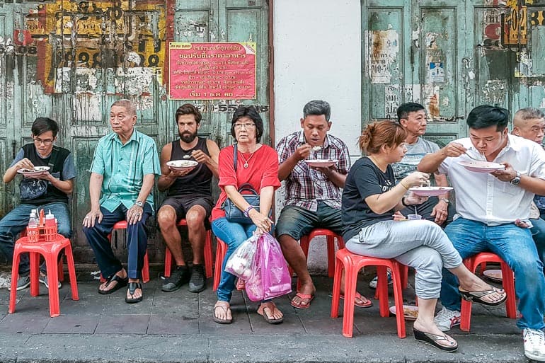 Eating street food in a famous curry stalls in Bangkok