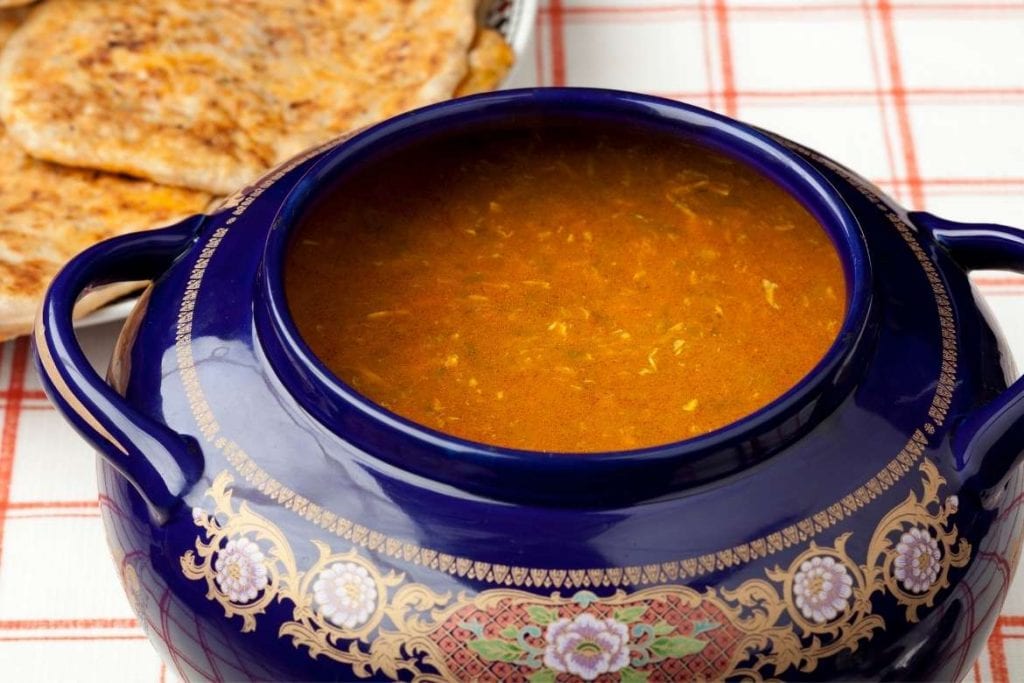 a blue pot with harira soup typical of Morocco