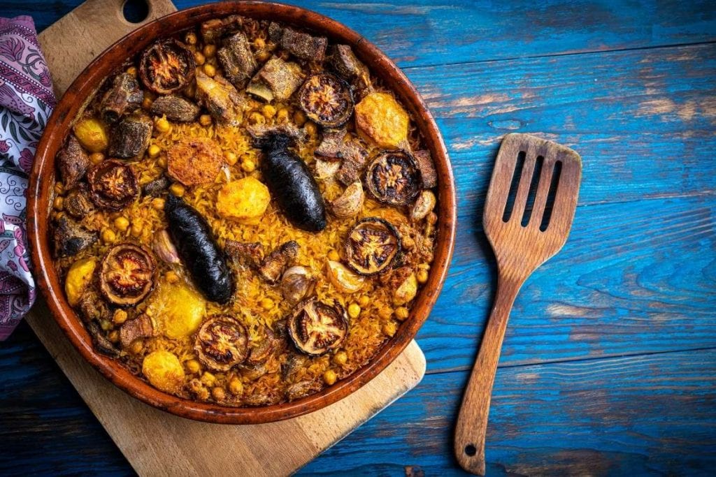 arroz al horno served on a round tray typical rice dish of Valencia Spain