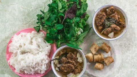 one of most typical Vietnamese food combining fresh rice noodles, pork, broth and fresh herbs