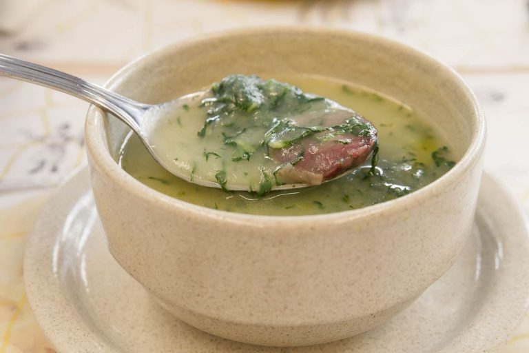Caldo Verde is a Portuguese soup made with potatoes, kale and chorizo