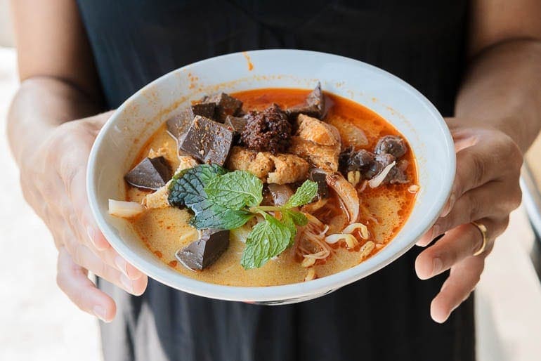 a bowl with curry mee also known as Curry Laska, typical malaysian food