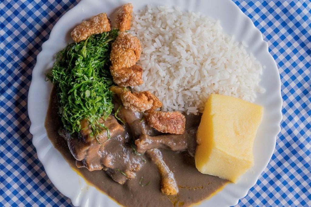 a Brazilian typical dish of chicken called frango a molho pardo in Dalva restaurant in Diamantina