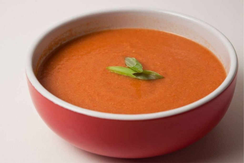 a bowl with spanish tomato soup gazpacho
