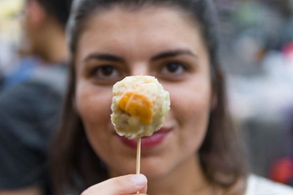 trying street food in Malaysia during a food tour