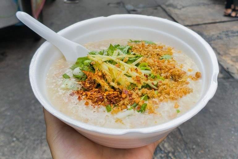 A bowl with Jok, rice porridge widely consumed in the mornings in Thailand