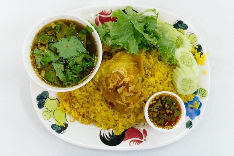 thai style chicken biryani, a Thai dish with yellow rice and chicken influenced by Thai Muslims