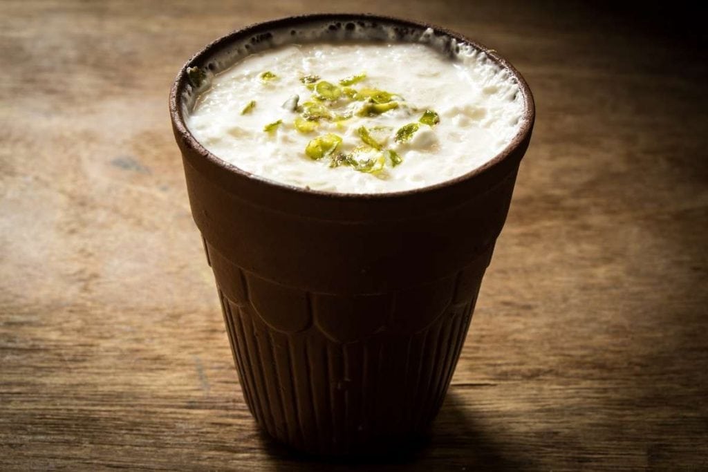 cup with lassi a traditional indian drink made with yoghurt