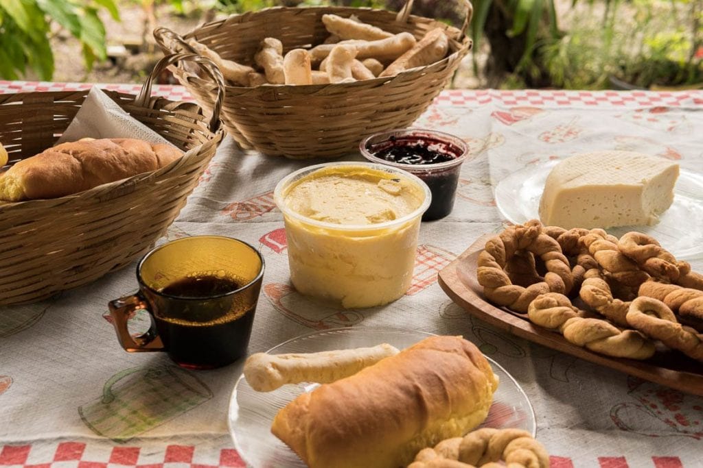 A table with Brazilian homemade snacks called Quitandas da Dona Geralda in the city of Milho Verde Minas Gerais