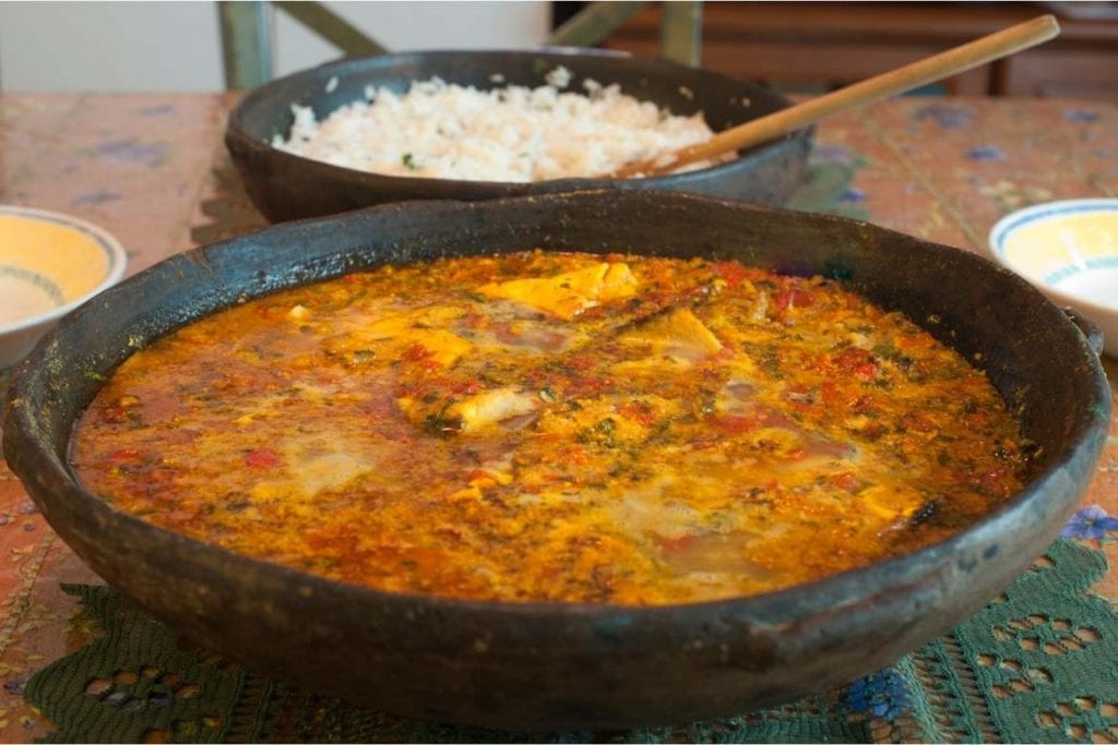 moqueca in the clay pot is a fish stew typical from brazil