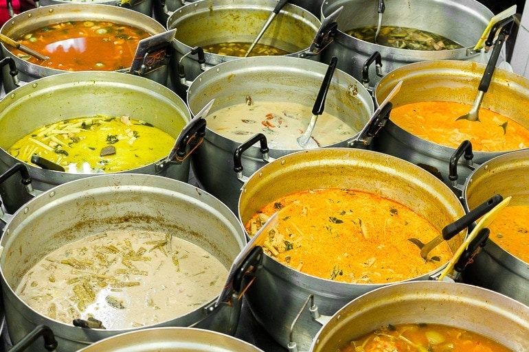 pots with various types of Thai curry, the curry serves as a base for many typical Thai dishes