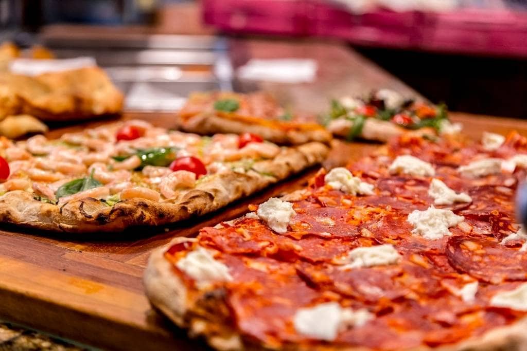 pizza al taglio on display in Rome